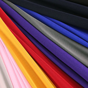 Selection of ITY Knit Jersey Fabric swatches, displaying the fabric's unique drape and vibrant color variations