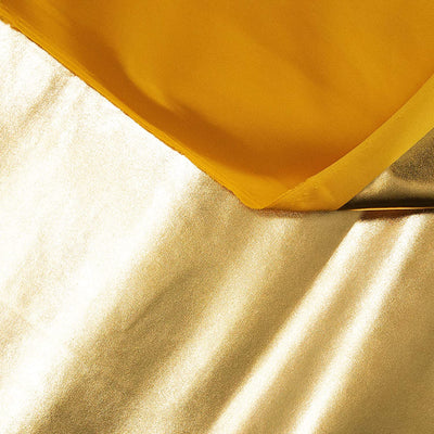 Metallic Lame Foil Spandex Knit Fabric | Gold - FabricLA.com